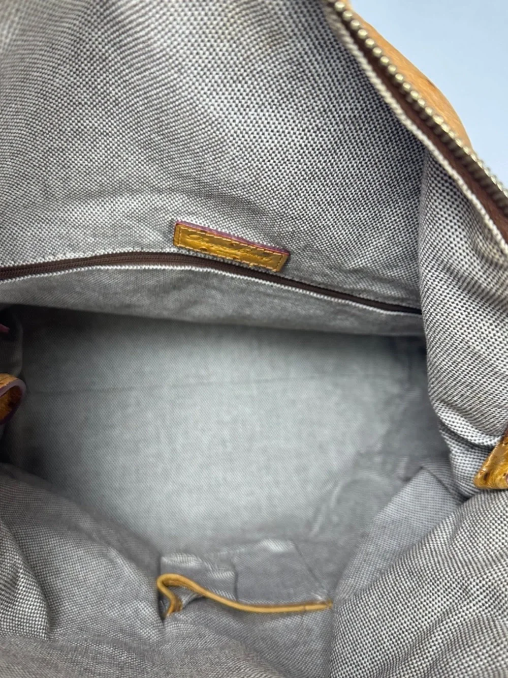 Dooney and Bourke Tan Ostrich Embossed Leather Double Front Zipper Compartments